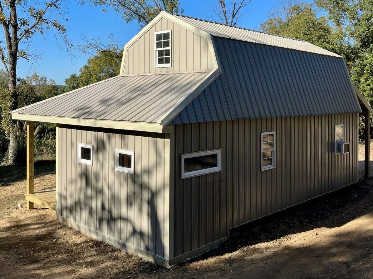 Bathroom addition with covered porch built onto a shed